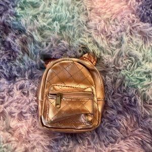 A cute mini backpack with pink glitter cat ears